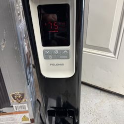 Brand New Pelonis Digital Oil Filled Radiator Heater 1500Watt With Remote. Must Pickup. 