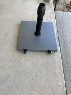 	•	Includes one umbrella base only 	•	Filled with cement 	•	Fits market umbrellas 6-12FT 	•	Built with a tube cap to accommodate umbrellas 6-12ft in d