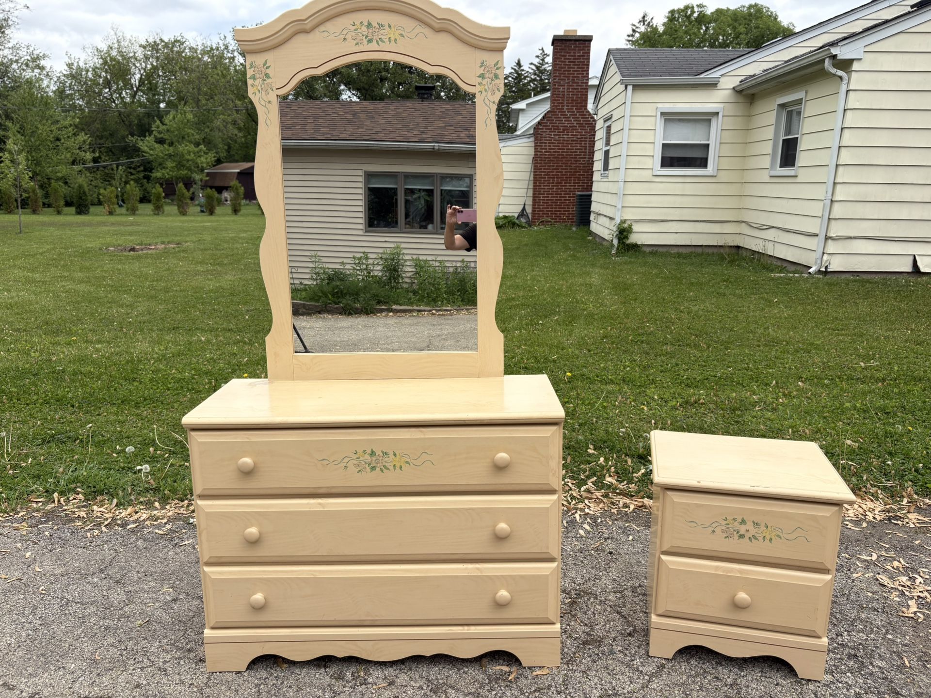 Cute 3 drawer dresser with mirror and matching nightstand. They have some cosmetic wear.