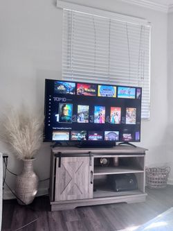 TV STAND RUSTED WOOD WITH SLIDING BARN DOOR