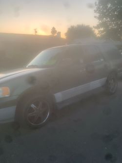 Ford Expedition 2003 tagged thru 4/2027, runs, rims $2,500