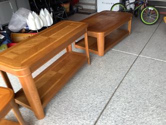 Living room oak coffee table, matching sofa table, 2 end tables no issues, the coffee table has wheels for easy movement.  Sofa table is approximately