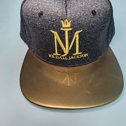 Michael Jackson “ONE” Cirque du Soleil Snapback Hat – Black & Gold