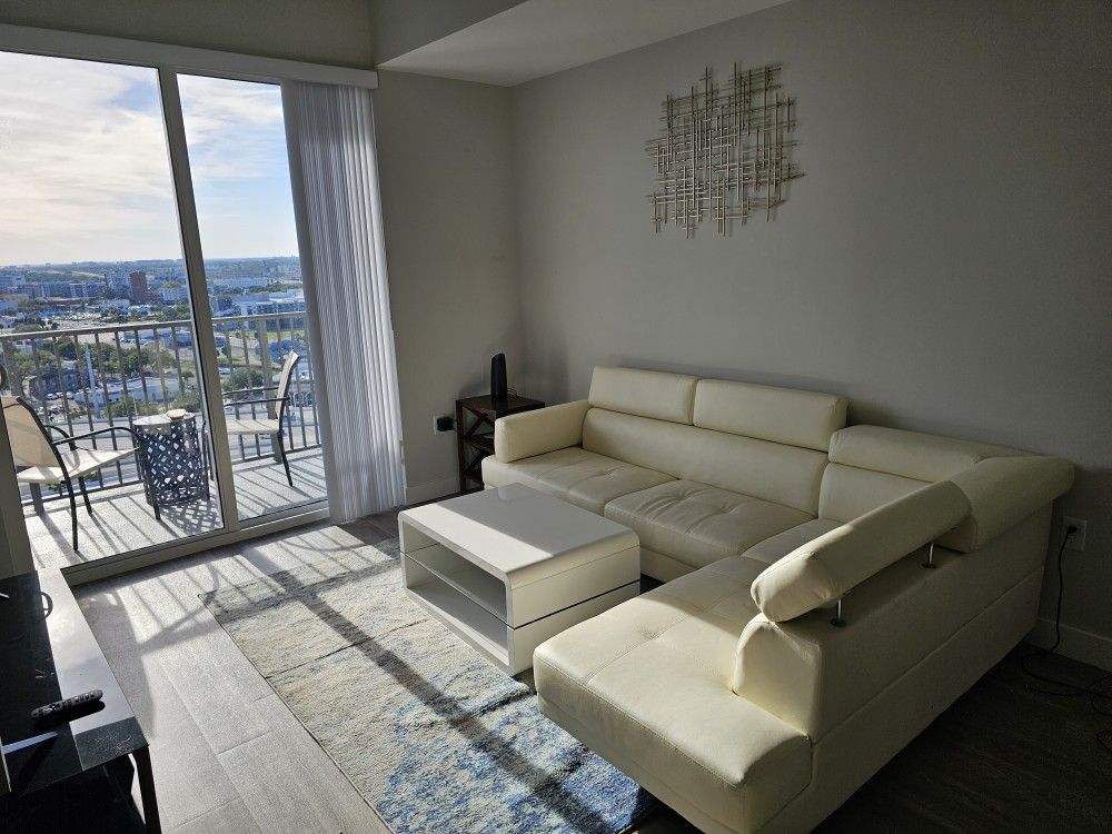 Beautiful And Immaculate L- Shape Couch With Coffee Table