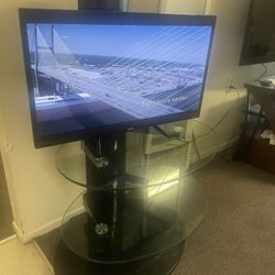 Roku Tv. And Stand  Works Exelente. 30 Inch’s  With. Control