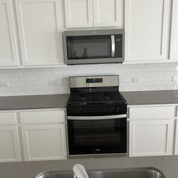 Brand New Whirlpool Stove And Microwave Set