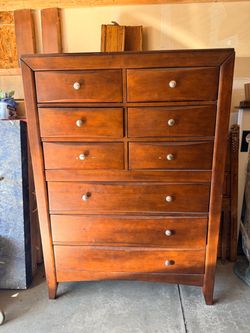 Matching solid wood queen size bed frame and tall his dresser