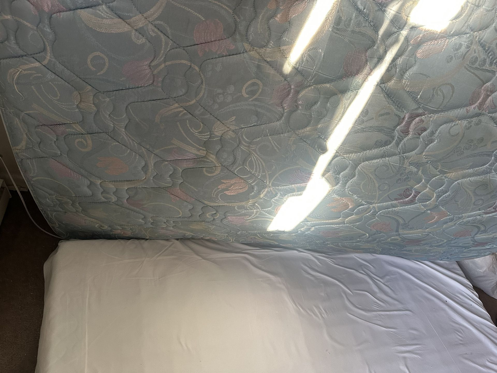 Queen Mattress And Box Spring.