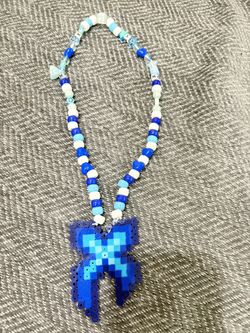 Excision Necklace