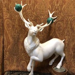 Large decorative reindeer in faux marble with faux malachite sphere ornaments