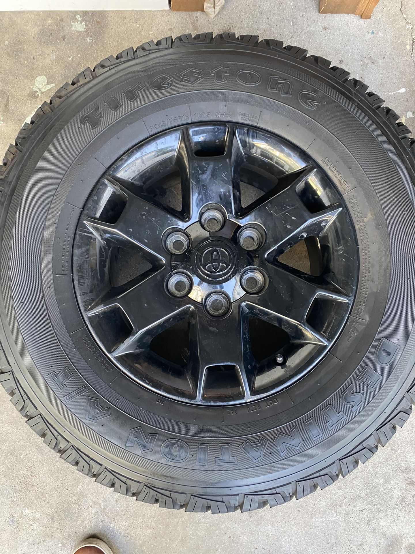 Firestone Destination A/T Tires and Toyota OEM Baja 16in Alloy Wheels