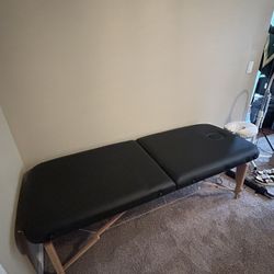 Massage table