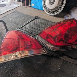 Fits 2006 to 2013 
Chevy Impala  Tail Light set USED OEM.....$65 for both....