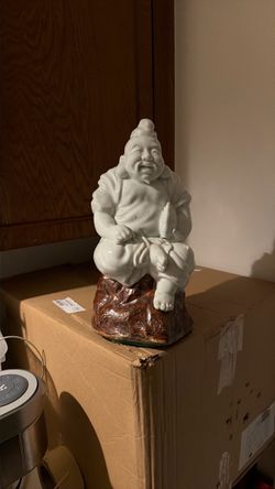 White Glazed Ceramic Figurine on Brown Base