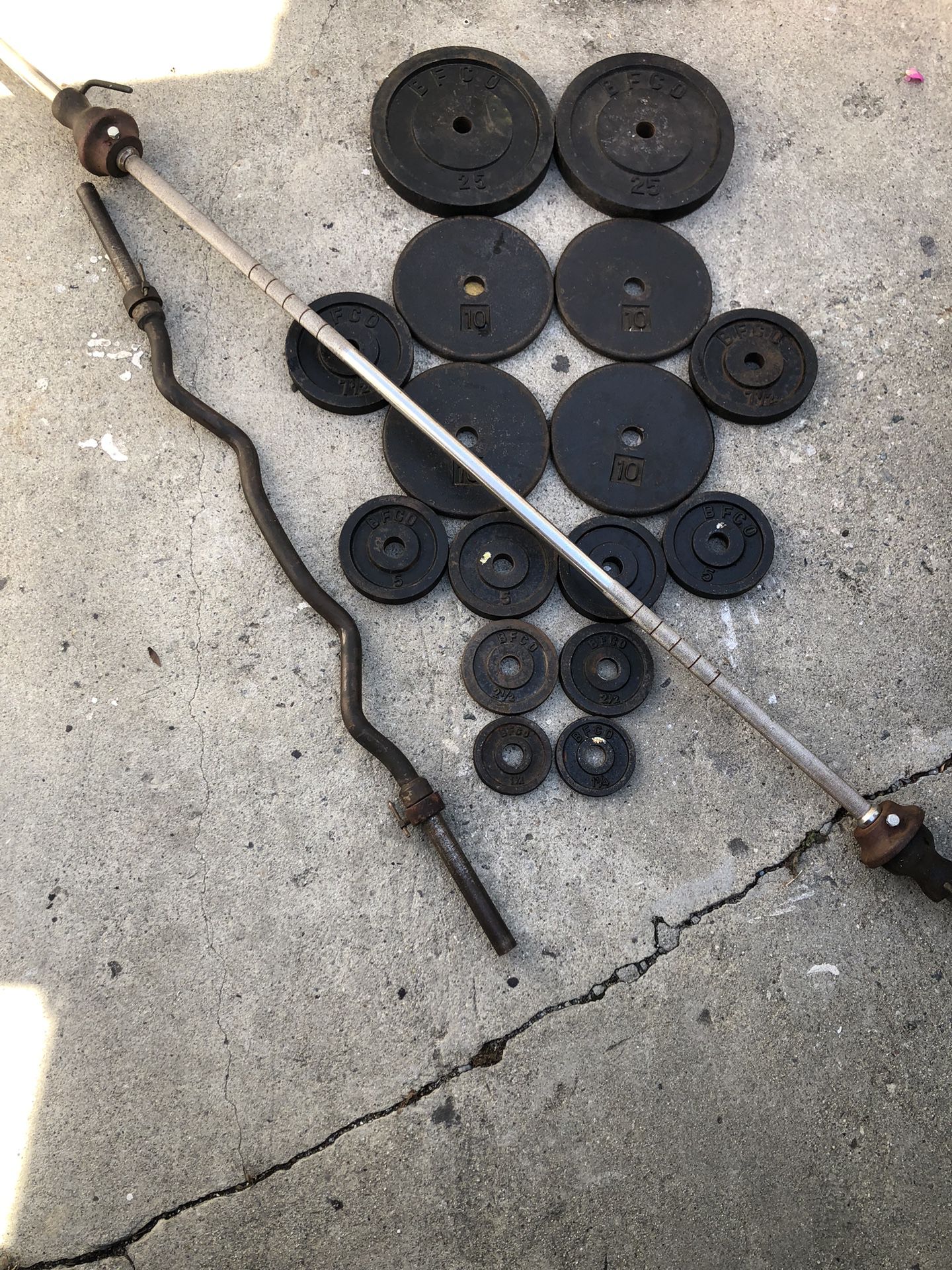 Standard Weights With Straight Bar and Curl Bar. Selling all together for $130 firm