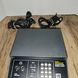 Kodak Ektagraphic programmable dissolve control for two Kodak slide projectors. Has light wear from age and use. Sold as is.