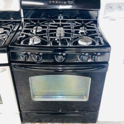 GE black stove, a receipt for a 60-day warranty