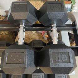 PAIR OF 50 LB. RUBBER DUMBBELLS 