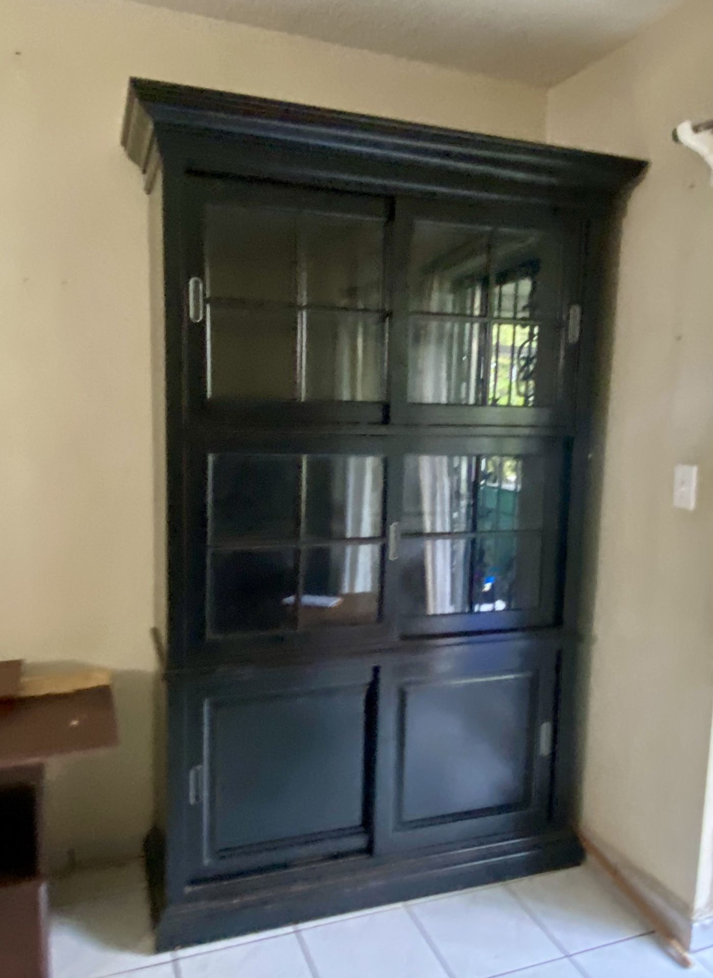Great Cabinet W Sliding Doors And Lighted Shelf With Plenty Of Storage 
