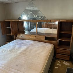 Matching king sized bed frame and dresser with mirror 