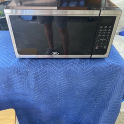 Brand New Oster Microwave