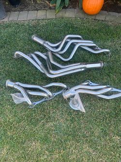 2 sets of  Chevy small block engines  heathers