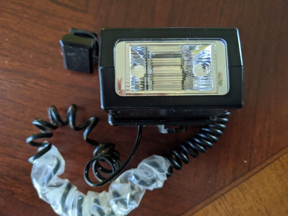 Handheld camera flash