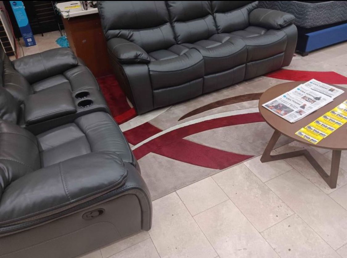 Holiday sale. Madrid, gray leather reclining sofa and loveseat set only $1299. Easy finance option. Same day delivery.