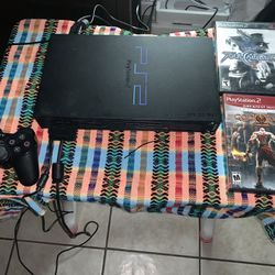 PLAYSTATION 2 SYSTEM WITH 2 GAMES 