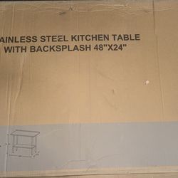 NEW 48”x24” stainless steel table w/ backsplash