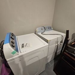 Whirlpool High-efficiency Top load washer and Electric Dryer