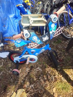 Price is firm.. Little boys Spider-Man bike