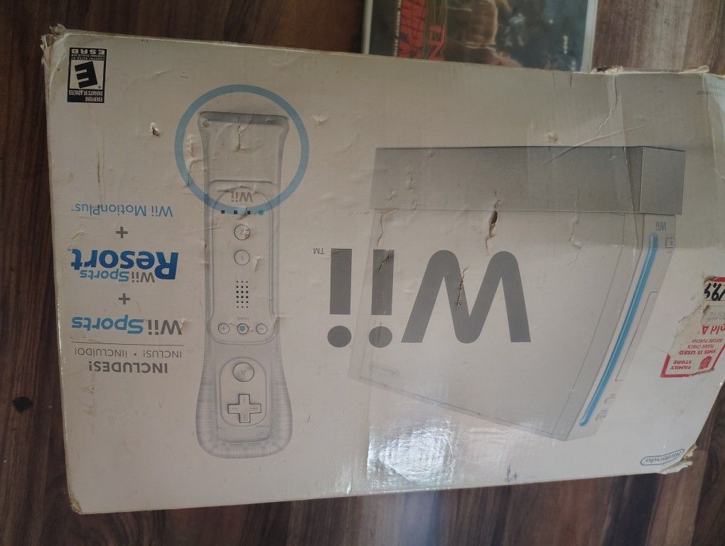 Wii System And Games With Some Attachments 