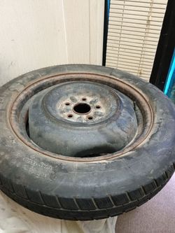 Spare Donut Tire from 2004 Toyota Sienna