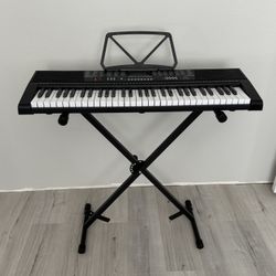 Piano and Stand $30