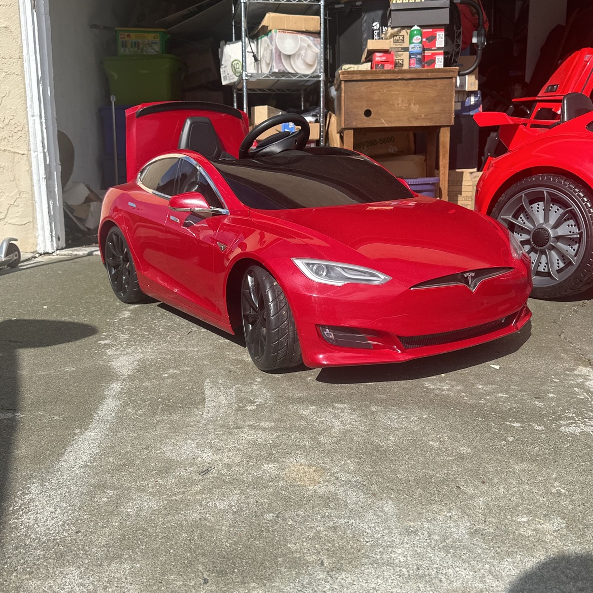 $100 OBO. Kids Tesla Model S