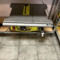 RYOBI 10” TABLE SAW WITH FOLDING STAND