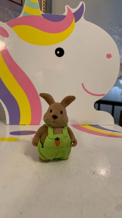 Li’l Woodzeez Cottonball Rabbit figure wearing green overalls toy