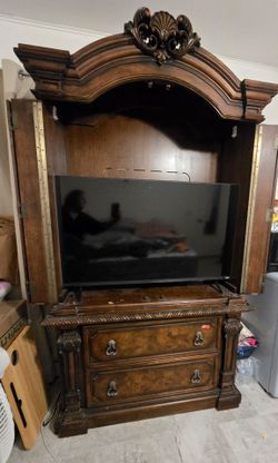 Large solid wood armoir and matching night stand