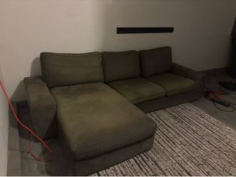 Grey “L” shaped couch
