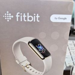 Fitbit Luxe with charger and extra band