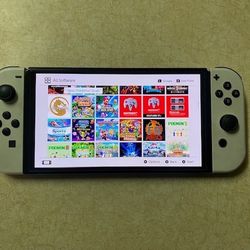 NINTENDO SWITCH OLED Loaded With 100 Switch Games And 7500 Retro Games