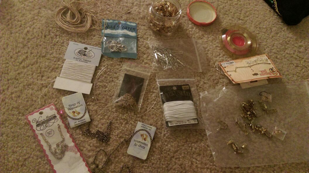 Lots of jewelry making supplies.