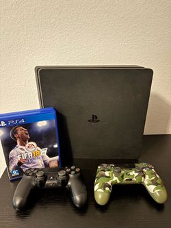 PS4 Slim bundle. Console, two controllers, three games and all cables.