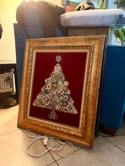 Vintage Christmas Tree with beautiful gold frame.