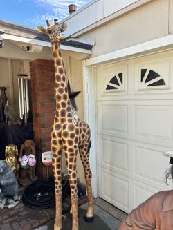 Life size fiberglass giraffe statue