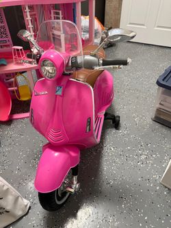 Vespa pink motorcycle