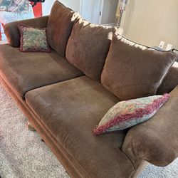 2 Couches With Pull-out Twin Bed + Ottoman  