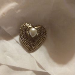6$ Cute Little Heart Pin/Brooch Goldtoned Over Some Sort Of Strong Plastic. Small Gold Chip On Back As Pictured. Faux Pearl On Golden Heart.