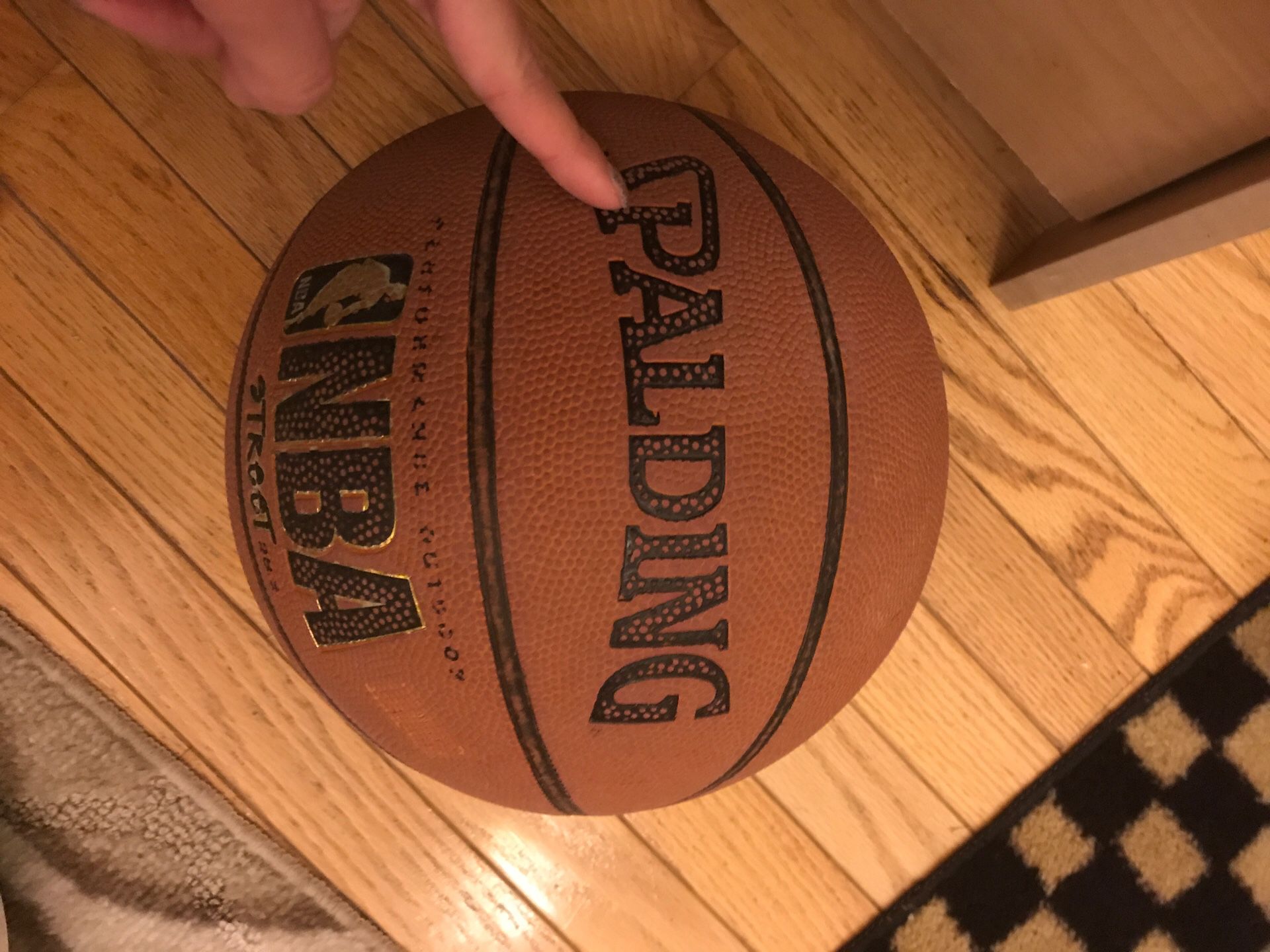 A small used basketball Ball